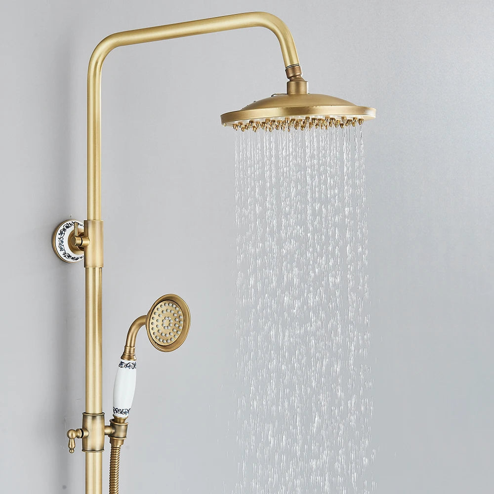 Sistema de ducha retro de latón antiguo con rociador efecto lluvia y ducha de mano